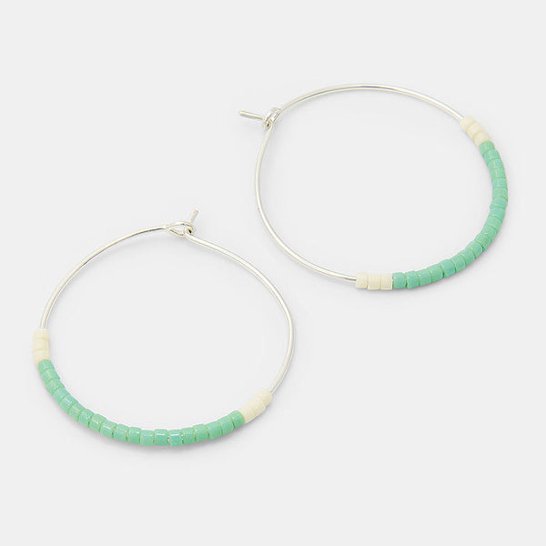 Mint green beaded silver hoop earrings