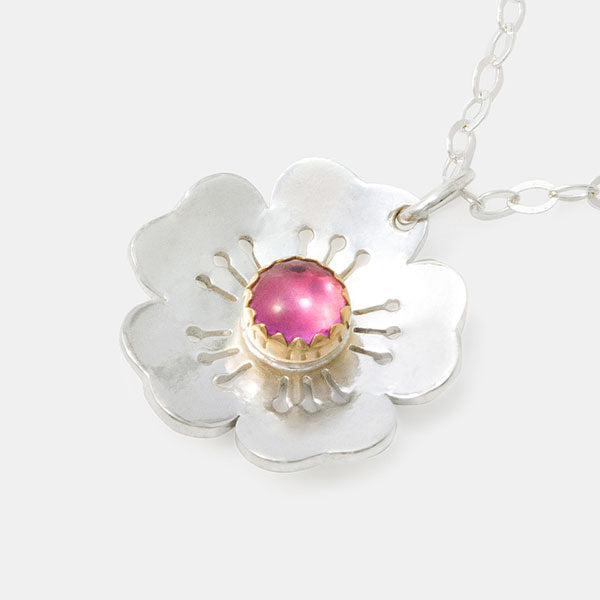 Cherry blossom pendant with solid gold and pink sapphire by Australian jewellery designer Simone Walsh