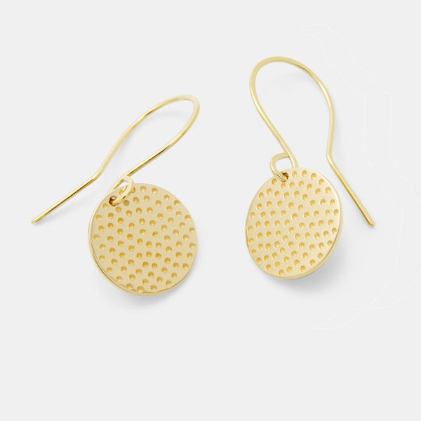 Gold jewellery, including these solid gold drop earrings.