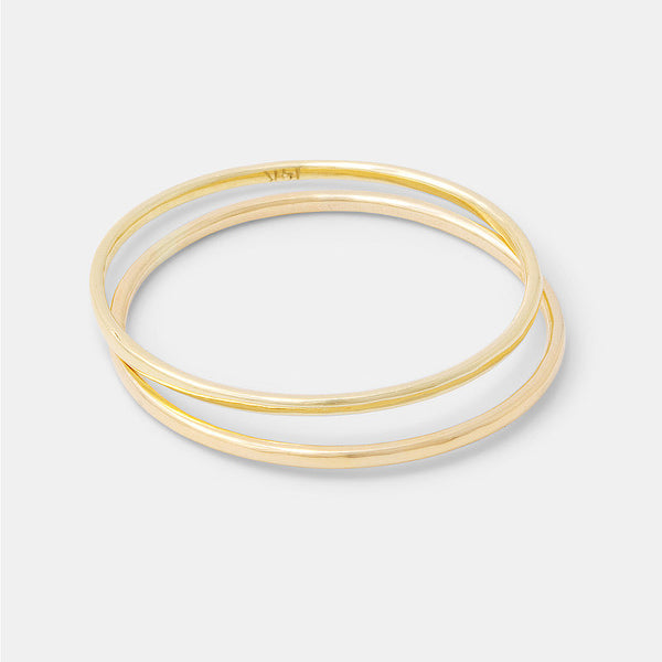 Solid gold skinny stacking rings set handmade by Australian jeweller Simone Walsh