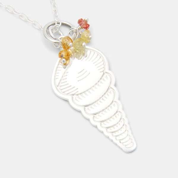 Silver jewellery, including this spiral shell pendant